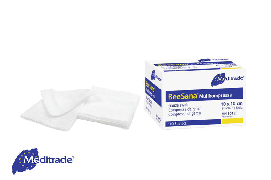 Meditrade BeeSana® Mullkompresse unsteril in der 100Stk. Box, daneben ausgepackte Mullkompressen
