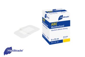 Meditrade ABE® Wundschnellverband aus Vlies mit Verpackung, daneben ein einzelnes Pflaster